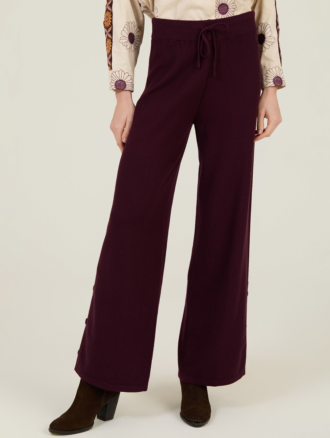 pantalón punto burdeos